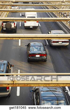 High angle view of cars moving on a road, Brooklyn Bridge, New York City, New York State, USA View Large Photo Image Stock Photography - High angle view of cars moving on a road, Brooklyn Bridge, New York City, New York State, USA. Fotosearch