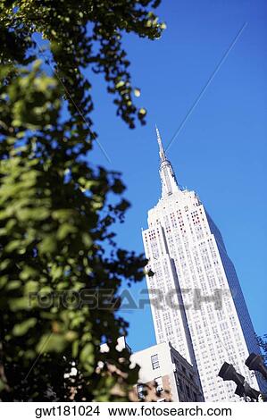 Low angle view of a building, Empire State Building, Manhattan, New York City, New York State, USA View Large Photo Image Picture - Low angle view of a building, Empire State Building, Manhattan, New York City, New York State, USA. Fotosearch