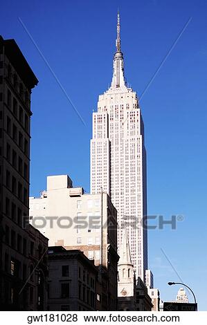 Low angle view of a building, Empire State Building, Manhattan, New York City, New York State, USA View Large Photo Image Stock Photo - Low angle view of a building, Empire State Building, Manhattan, New York City, New York State, USA. Fotosearch