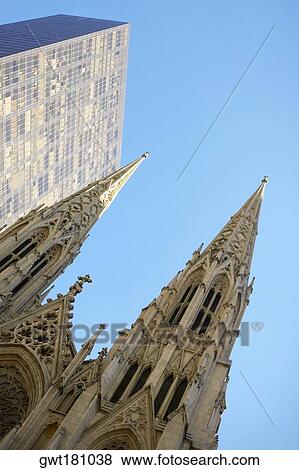 Low angle view of a cathedral, St. Patrick's Cathedral, Manhattan, New York City, New York State, USA View Large Photo Image Stock Photo - Low angle view of a cathedral, St. Patrick's Cathedral, Manhattan, New York City, New York State, USA. Fotosearch