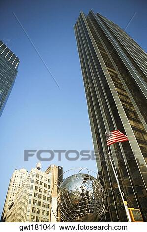 Low angle view of a sculpture of globe, Columbus Circle, Manhattan, New York City, New York State, USA View Large Photo Image Picture - Low angle view of a sculpture of globe, Columbus Circle, Manhattan, New York City, New York State, USA. Fotosearch