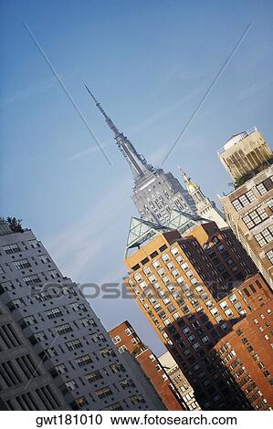 Low angle view of buildings, Empire State Building, Manhattan, New York City, New York State, USA View Large Photo Image Stock Image - Low angle view of buildings, Empire State Building, Manhattan, New York City, New York State, USA. Fotosearch