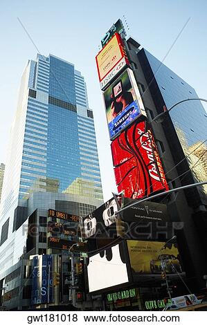 Low angle view of buildings in a city, Times Square, Manhattan, New York City, New York State, USA View Large Photo Image Stock Photo - Low angle view of buildings in a city, Times Square, Manhattan, New York City, New York State, USA. Fotosearch