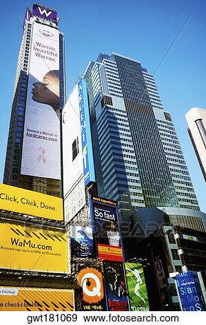 Low angle view of buildings in a city, Times Square, Manhattan, New York City, New York State, USA View Large Photo Image Stock Photo - Low angle view of buildings in a city, Times Square, Manhattan, New York City, New York State, USA. Fotosearch