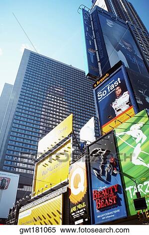 Low angle view of buildings in a city, Times Square, Manhattan, New York City, New York State, USA View Large Photo Image Stock Photography - Low angle view of buildings in a city, Times Square, Manhattan, New York City, New York State, USA. Fotosearch