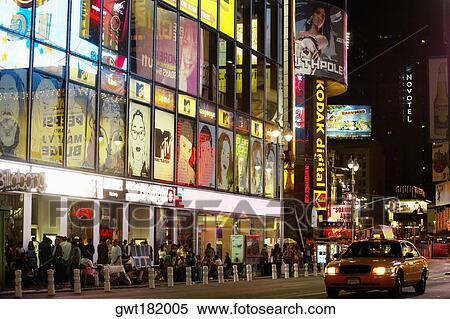 Building lit up at night in a city, Times Square, Manhattan, New York City, New York State, USA View Large Photo Image Stock Photography - Building lit up at night in a city, Times Square, Manhattan, New York City, New York State, USA. Fotosearch