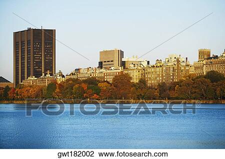 Buildings at the waterfront, Central Park, Manhattan, New York City, New York State, USA View Large Photo Image Stock Image - Buildings at the waterfront, Central Park, Manhattan, New York City, New York State, USA. Fotosearch