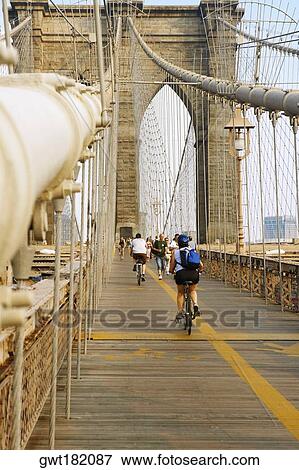 Group of people on a bridge, Brooklyn Bridge, New York City, New York State, USA View Large Photo Image Stock Photo - Group of people on a bridge, Brooklyn Bridge, New York City, New York State, USA. Fotosearch