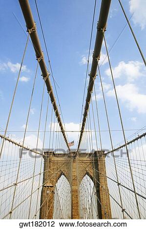 Low angle view of a bridge, Brooklyn Bridge, New York City, New York State, USA View Large Photo Image Stock Image - Low angle view of a bridge, Brooklyn Bridge, New York City, New York State, USA. Fotosearch