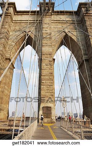 Low angle view of a bridge, Brooklyn Bridge, New York City, New York State, USA View Large Photo Image Stock Image - Low angle view of a bridge, Brooklyn Bridge, New York City, New York State, USA. Fotosearch