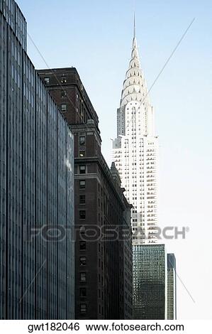 Low angle view of buildings in a city, Chrysler Building, Manhattan, New York City, New York State, USA View Large Photo Image Stock Photograph - Low angle view of buildings in a city, Chrysler Building, Manhattan, New York City, New York State, USA. Fotosearch