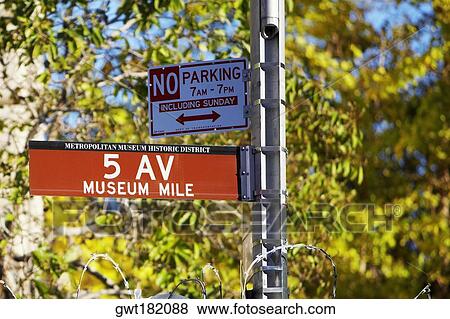 No parking signboard on a pole, Fifth Avenue, Manhattan, New York City, New York State, USA View Large Photo Image Stock Photo - No parking signboard on a pole, Fifth Avenue, Manhattan, New York City, New York State, USA. Fotosearch