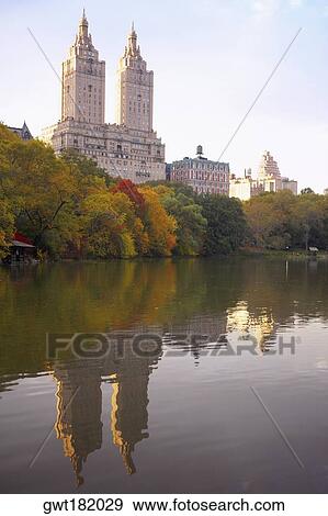 Reflection of buildings in water, San Remo, New York City, New York State, USA View Large Photo Image Stock Photo - Reflection of buildings in water, San Remo, New York City, New York State, USA. Fotosearch