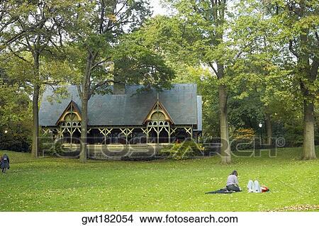 Trees in front of a building, Central Park, Manhattan, New York City, New York State, USA View Large Photo Image Picture - Trees in front of a building, Central Park, Manhattan, New York City, New York State, USA. Fotosearch