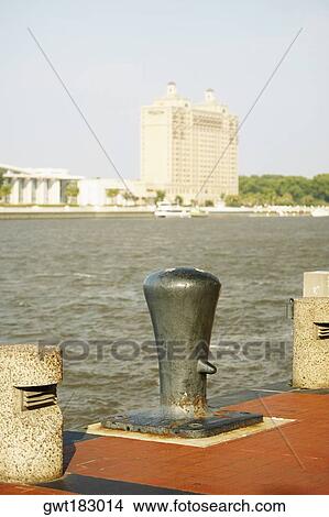 Close-up of a bollard with a building in the background, Savannah, Georgia, USA View Large Photo Image Picture - Close-up of a bollard with a building in the background, Savannah, Georgia, USA. Fotosearch