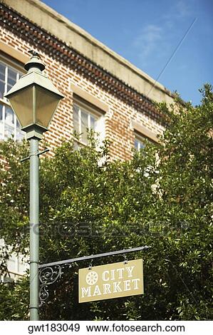 Low angle view of an information board hanging on a lamppost, Savannah, Georgia, USA View Large Photo Image Stock Photo - Low angle view of an information board hanging on a lamppost, Savannah, Georgia, USA. Fotosearch