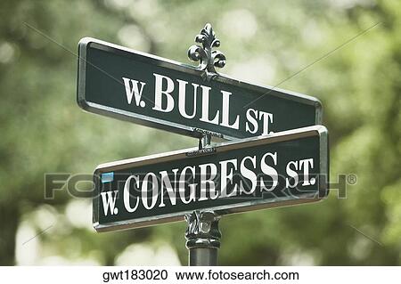 Low angle view of road signs View Large Photo Image Stock Image - Low angle view of road signs. Fotosearch