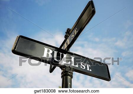 Low angle view of road signs View Large Photo Image Stock Photo - Low angle view of road signs. Fotosearch