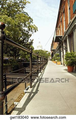 Walkway in front of stores, Savannah Cotton Exchange, Savannah, Georgia, USA View Large Photo Image Stock Image - Walkway in front of stores, Savannah Cotton Exchange, Savannah, Georgia, USA. Fotosearch