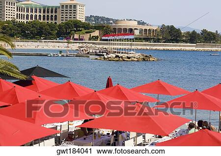 Beach umbrellas on the beach, Monte Carlo, Monaco View Large Photo Image Stock Image - Beach umbrellas on the beach, Monte Carlo, Monaco. Fotosearch