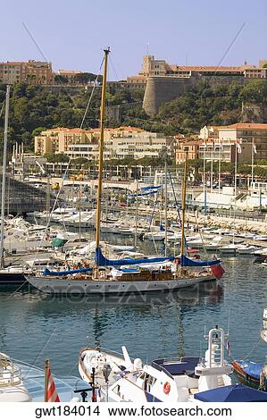 Boats docked at a harbor, Port of Fontvieille, Monte Carlo, Monaco View Large Photo Image Picture - Boats docked at a harbor, Port of Fontvieille, Monte Carlo, Monaco. Fotosearch