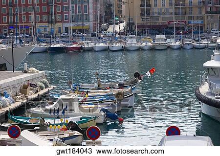Boats docked at a harbor, Port of Fontvieille, Monte Carlo, Monaco View Large Photo Image Stock Image - Boats docked at a harbor, Port of Fontvieille, Monte Carlo, Monaco. Fotosearch