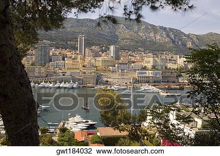 Cruise ship and boats docked at a harbor, Port of Fontvieille, Monte Carlo, Monaco View Large Photo Image Stock Image - Cruise ship and boats docked at a harbor, Port of Fontvieille, Monte Carlo, Monaco. Fotosearch