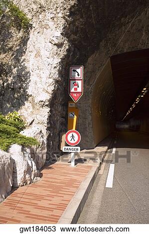 Road sign at the entrance of a tunnel, Monte Carlo, Monaco View Large Photo Image Stock Image - Road sign at the entrance of a tunnel, Monte Carlo, Monaco. Fotosearch