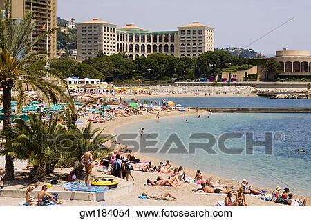 Tourists on the beach, Monte Carlo, Monaco View Large Photo Image Picture - Tourists on the beach, Monte Carlo, Monaco. Fotosearch
