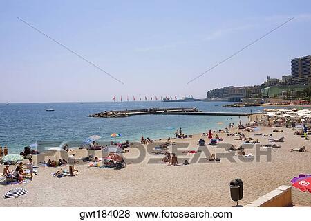 Tourists on the beach, Monte Carlo, Monaco View Large Photo Image Stock Photo - Tourists on the beach, Monte Carlo, Monaco. Fotosearch