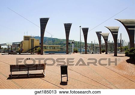 Empty bench near sculptures in a city, Barcelona, Spain View Large Photo Image Stock Image - Empty bench near sculptures in a city, Barcelona, Spain. Fotosearch