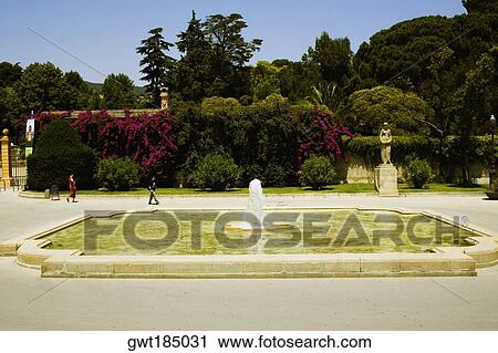Fountain in a garden, Parc Guell, Barcelona, Spain View Large Photo Image Stock Image - Fountain in a garden, Parc Guell, Barcelona, Spain. Fotosearch