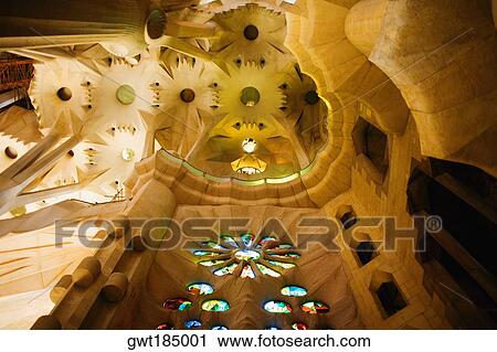 Stock Image - Interiors of a church, Sagrada Familia, Barcelona, Spain. Fotosearch