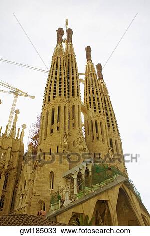 Stock Image - Low angle view of a church, Sagrada Familia, Barcelona, Spain. Fotosearch