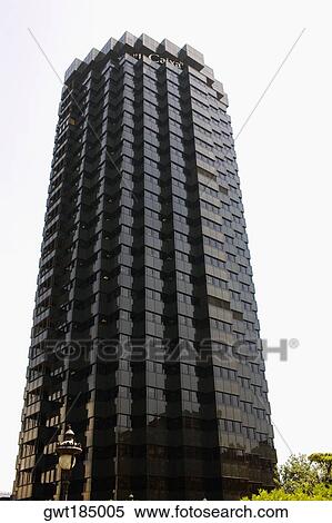 Stock Photography - Low angle view of a financial building, La Caixa, Barcelona, Spain. Fotosearch
