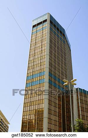 Low angle view of a skyscraper, Barcelona, Spain View Large Photo Image Stock Image - Low angle view of a skyscraper, Barcelona, Spain. Fotosearch