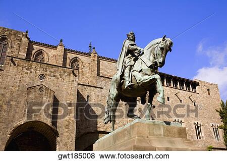 Low angle view of a statue on a pedestal in front of a building, Barcelona, Spain View Large Photo Image Stock Photo - Low angle view of a statue on a pedestal in front of a building, Barcelona, Spain. Fotosearch