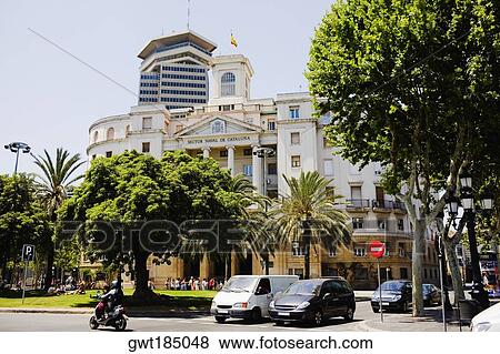 Trees in front of a building, Barcelona, Spain View Large Photo Image Stock Photo - Trees in front of a building, Barcelona, Spain. Fotosearch