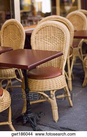 Chairs and tables in a restaurant, Paris, France View Large Photo Image Picture - Chairs and tables in a restaurant, Paris, France. Fotosearch