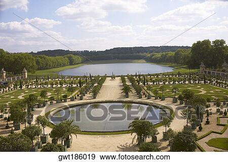 High angle view of a pond in a formal garden, Palace of Versailles, Versailles, France View Large Photo Image Stock Photo - High angle view of a pond in a formal garden, Palace of Versailles, Versailles, France. Fotosearch