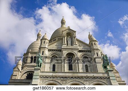 Stock Photo - Low angle view of a basilica, Basilique of the Sacre Coeur, Montmartre, Paris, France. Fotosearch