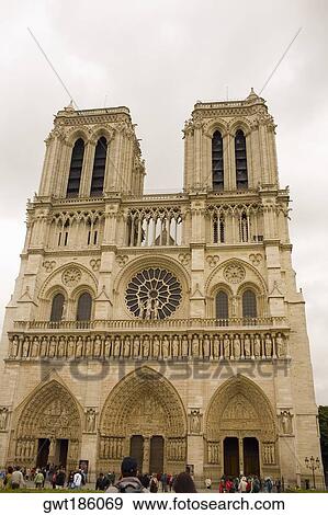 Stock Photo - Low angle view of a cathedral, Notre Dame Cathedral, Paris, France. Fotosearch