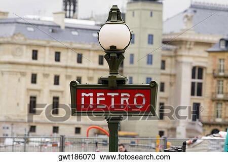 Stock Image - Signboard on a lamppost with buildings in the background, Paris, France. Fotosearch