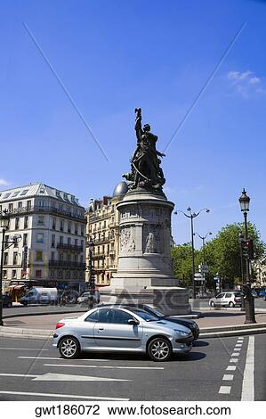 Stock Image - Statues at a town square, Paris, France. Fotosearch