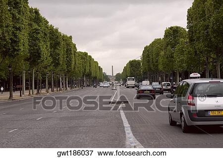 Traffic on a road, Paris, France View Large Photo Image Stock Photo - Traffic on a road, Paris, France. Fotosearch