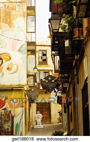 Stock Photo - Buildings along a street, Toledo, Spain. Fotosearch