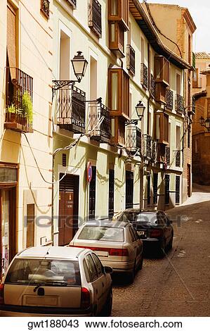 Stock Image - Cars parked on the street, Toledo, Spain. Fotosearch