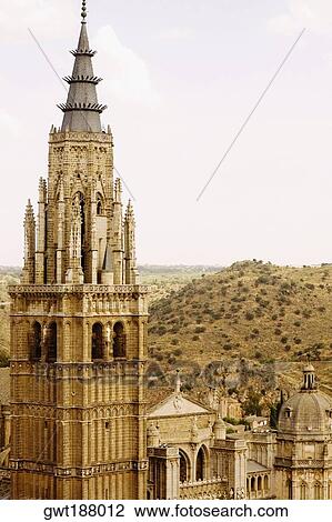 Stock Image - Cathedral in a city, Cathedral Of Toledo, Toledo, Spain. Fotosearch