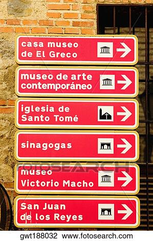 Stock Image - Close-up of directional signboards, Toledo, Spain. Fotosearch
