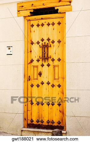 Stock Image - Closed door of a house, Toledo, Spain. Fotosearch